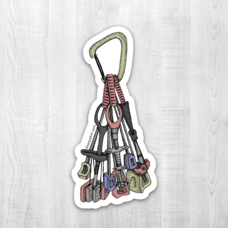 A colorful sticker showing tools suspended from a rope, designed for outdoor enthusiasts to personalize their gear.
