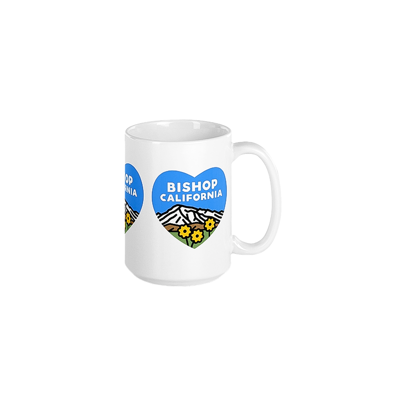 Glossy white mug with "Bishop California" and mountain heart, stylish and functional for coffee and tea lovers.