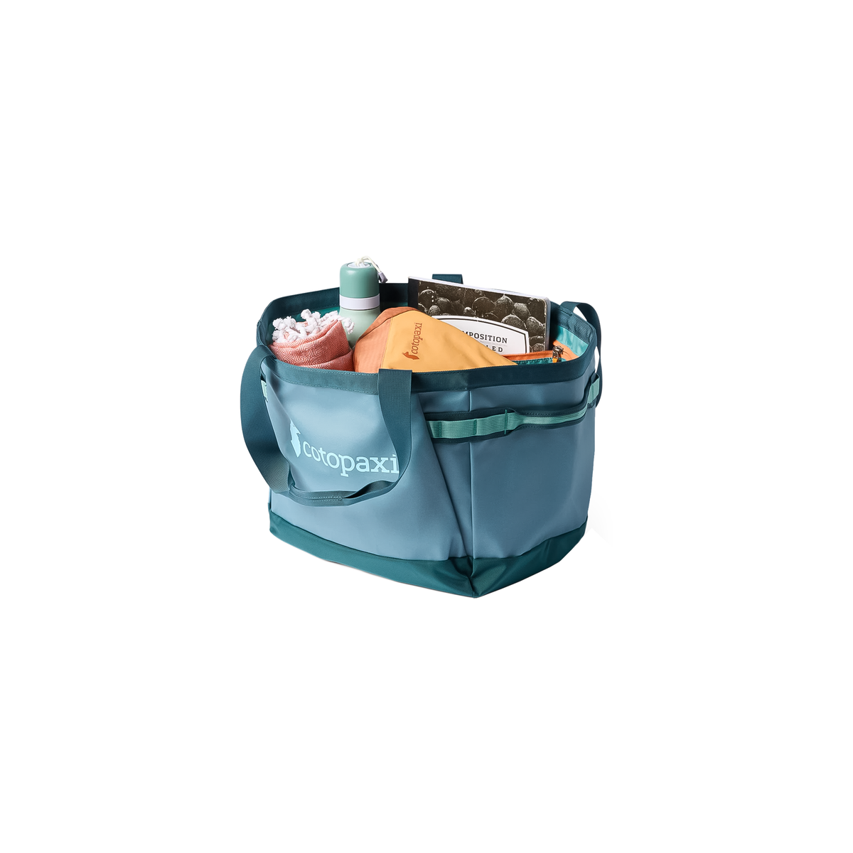 Spacious blue tote bag containing assorted gear, emphasizing its versatility and organized pockets for efficient packing.