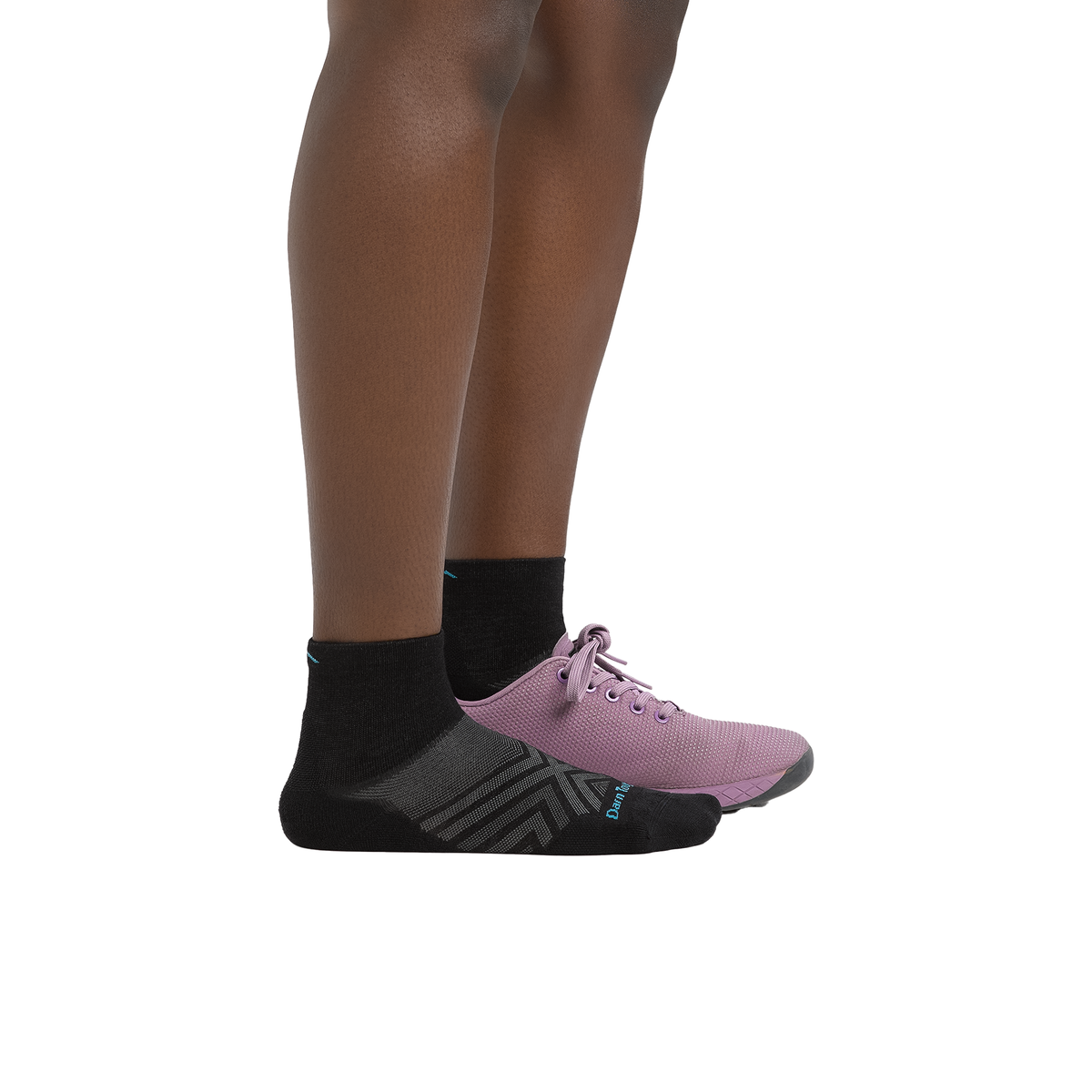 Quarter-length black running socks with gray stripes, made from a merino wool blend for breathability and blister resistance.