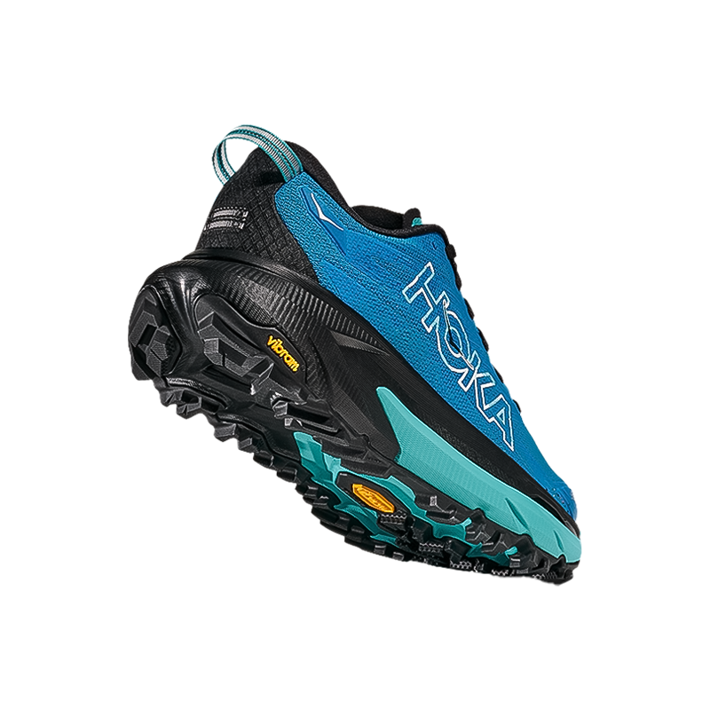 Blue, black, and teal women's HOKA Mafate 5 trail running shoe sole designed for comfort and stability with a cushioned midsole and grip.