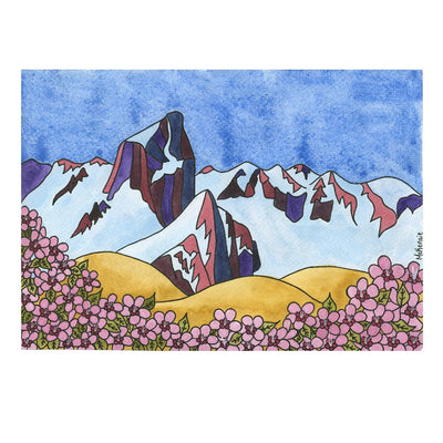 McKenzie Dale. Mt Humphreys notecard. The sky, painted in a gradient of soothing blues, sets a backdrop of tranquility, inviting you to indulge in moments of peaceful reflection. Beneath it, the mountain range stretches proudly, adorned in purples and blues with snow-kissed peaks that illustrate the lingering coolness of winter giving way to warmer days.