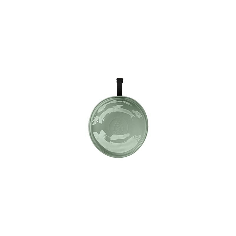 Green Hydrapak dog bowl with a black handle on a white background, designed for outdoor hydration.