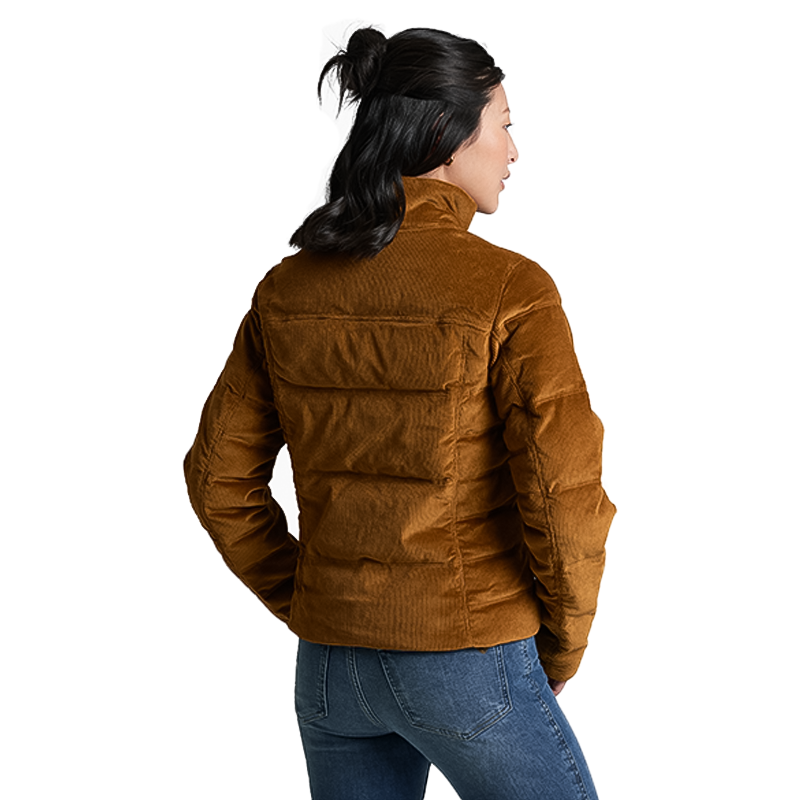 Back view of a woman in a brown Kühl Astrid Down Jacket with corduroy fabric and Sherpa collar.