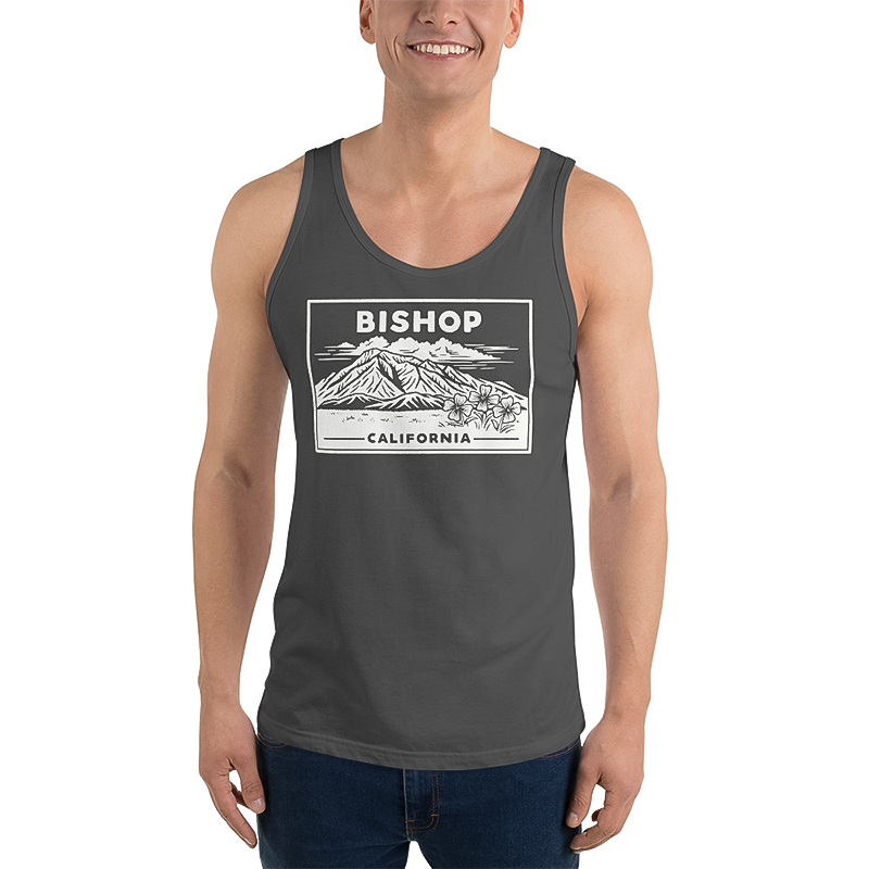 A man showcases a comfortable "bishop" tank top for warm weather.