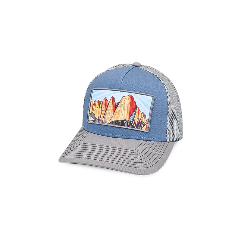 Blue and grey trucker hat featuring an illustrated Mt Whitney range by artist Alex Bailey on the front patch.