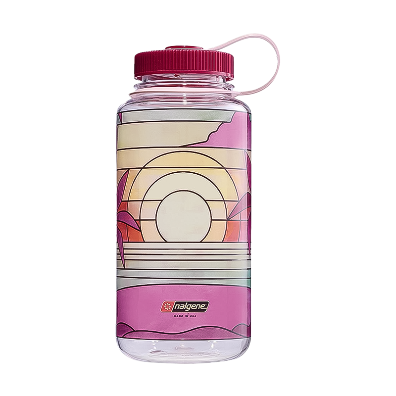 Eco-friendly fuchsia pink Nalgene water bottle with sunset, made from 50% recycled plastic for stylish hydration on the go.