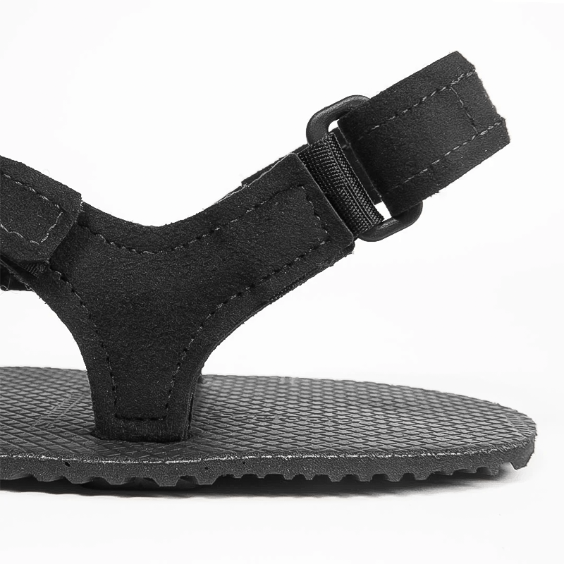 Black Shamma back-strap sandals designed for minimalist comfort for runners.