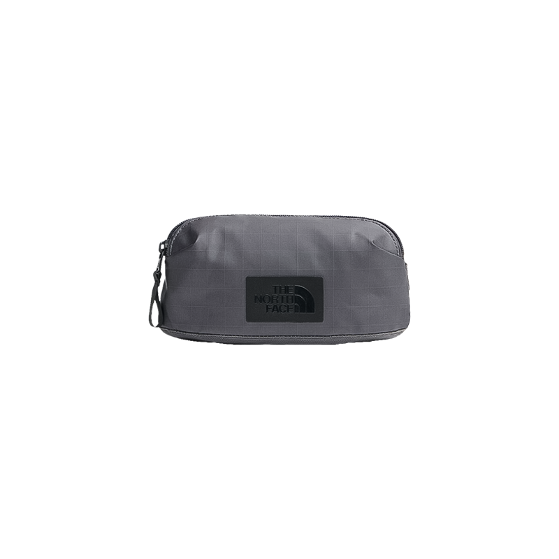 Grey North Face wash bag, compact and water-resistant, ideal for travel essentials with modular attachment system.