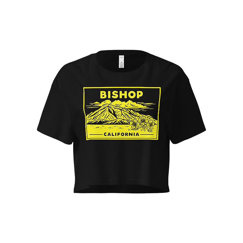 Black crop top with yellow "Bishop California" design made from soft, durable combed cotton for a relaxed fit.