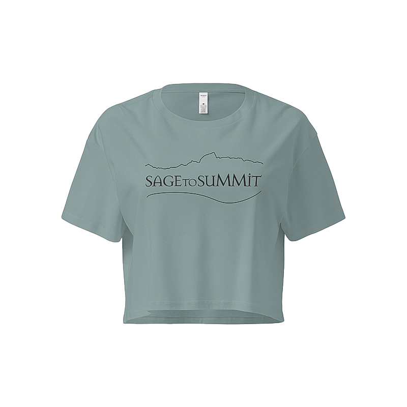 Blue women's crop top with "Sage to Summit" text, made from soft, durable cotton for outdoor comfort.