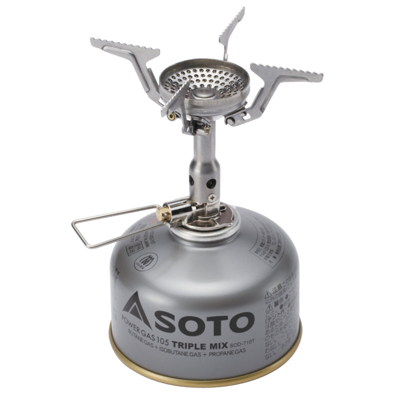 A small and light weight backpacking stove made by Soto, mounted on a small iso butane gas canister