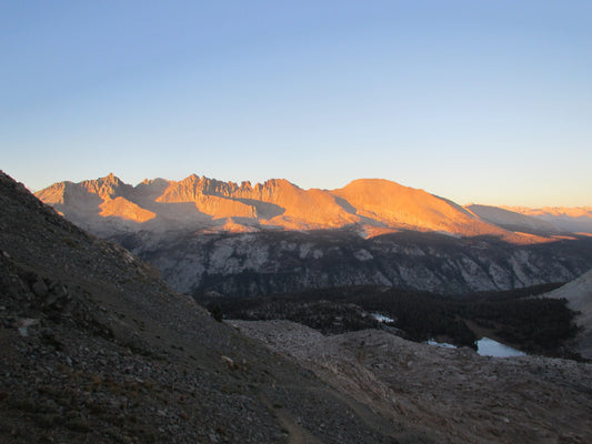 Mountain scape with lake trees and clouds