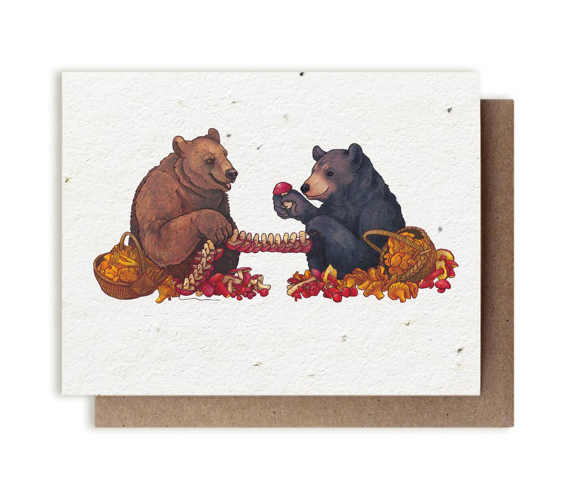 An image of a plantable card depicting two bears eating a string of red musrooms