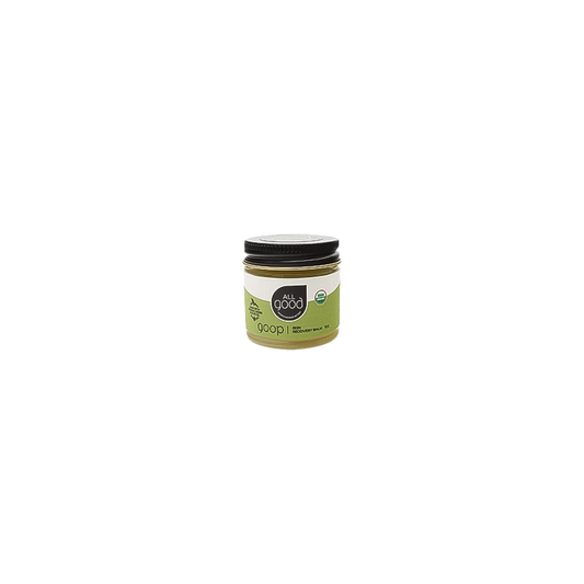 A bottle of 1 oz All Good Goop skin recovery balm on a white background. 