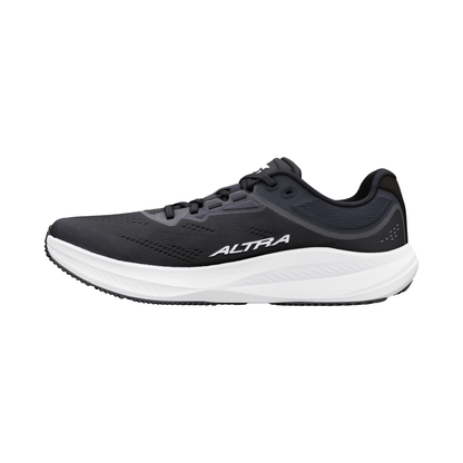 Side view of black and white Altra Torin 9 running shoe, emphasizing the dual-density midsole and Vibram outsole.