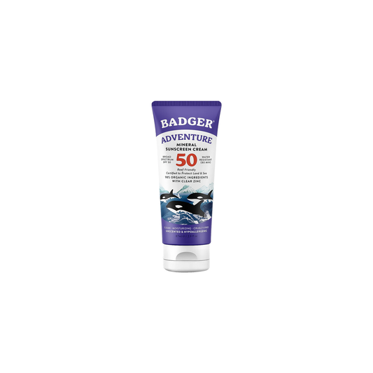 Badger Adventure SPF 50 Mineral Sunscreen Cream 87ml tube showcasing its eco-friendly packaging and key features for outdoor use.