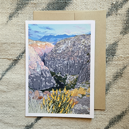 Greeting card showcasing Owens River Gorge with mountains and flowers, celebrating California's natural beauty and adventure.