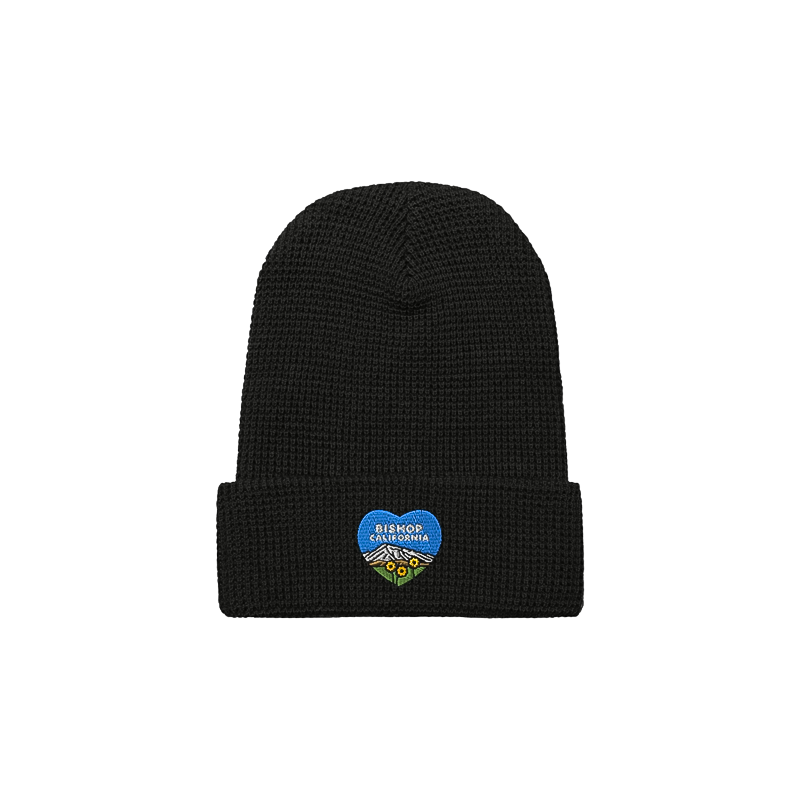 Cozy black beanie with a blue heart, designed with a unique waffle-knit for warmth and a stylish look.