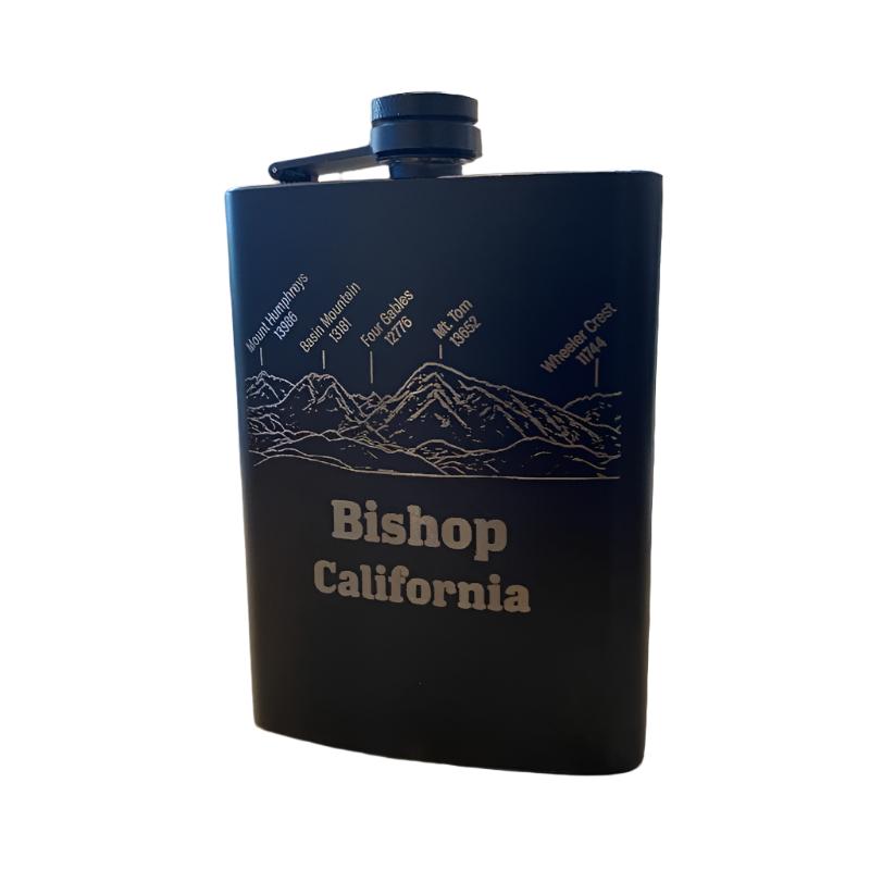 Black hip flask with "Bishop California," perfect for carrying memories of Bishop's landscapes.