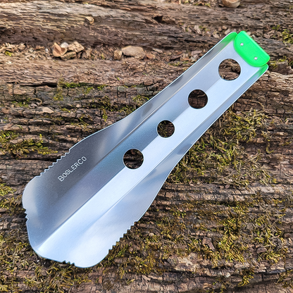 A neon green trowel lies on a tree, highlighting its ergonomic design for backpacking and gardening tasks.