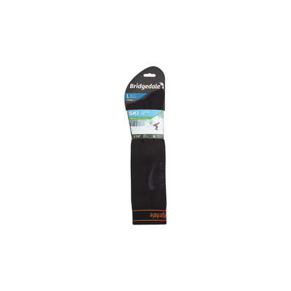 Black over-calf ski socks with orange and grey highlights, providing warmth and support for serious mountain athletes.