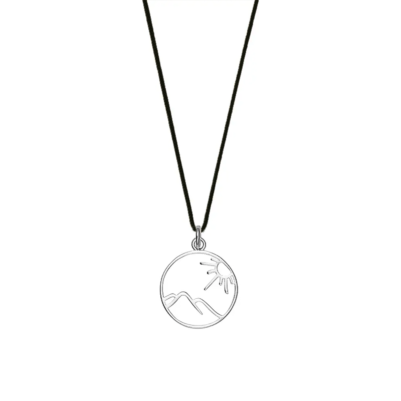 Olive lightweight nylon necklace with a sterling silver openwork mountain and tree pendant, ideal for everyday wear.