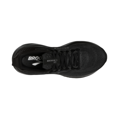 Close-up of black Brooks Adrenaline GTS 25 shoes, highlighting the breathable mesh upper and GuideRails™ support system for stability.