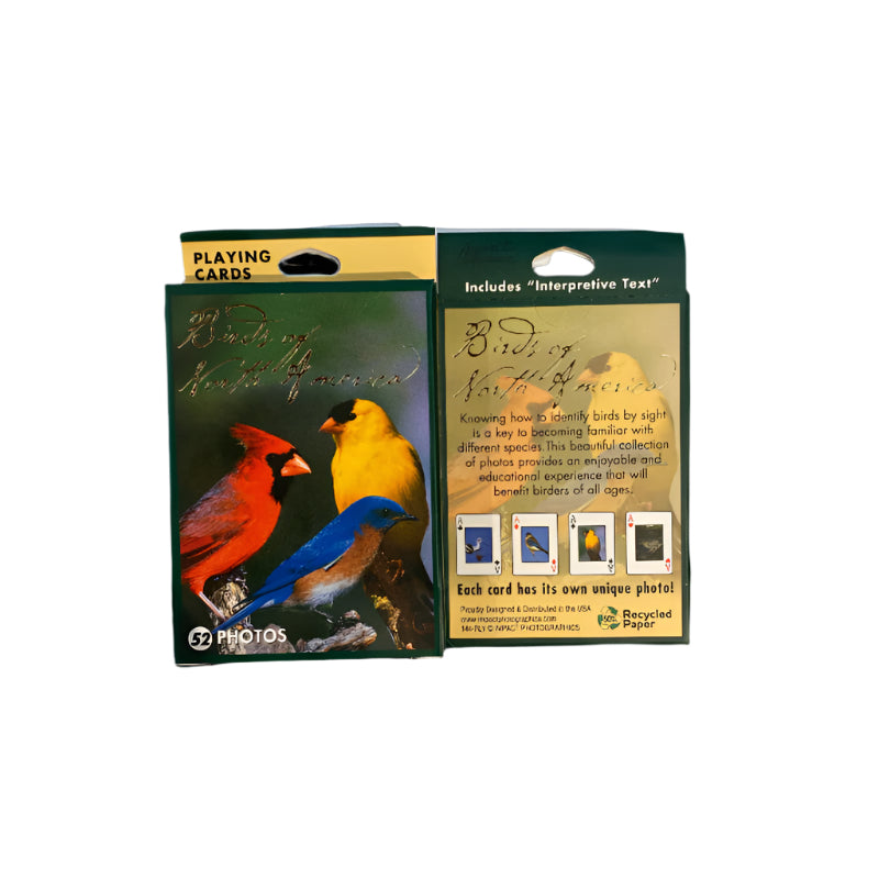 Two playing card decks on a white surface with wooden sides