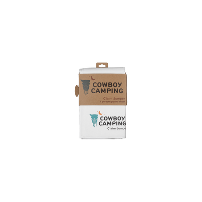 Cowboy Camping Claim Jumper ultralight groundsheet packaging on a white background for backcountry camping and moisture protection.