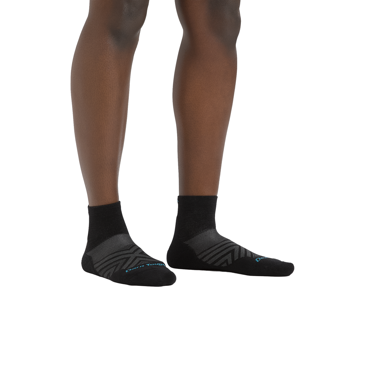 A pair of black running socks with gray stripes, featuring a quarter-height design and cushioned footbed for comfort.