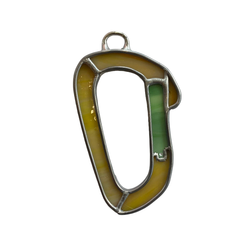 Metal carabiner on a white sheet of paper