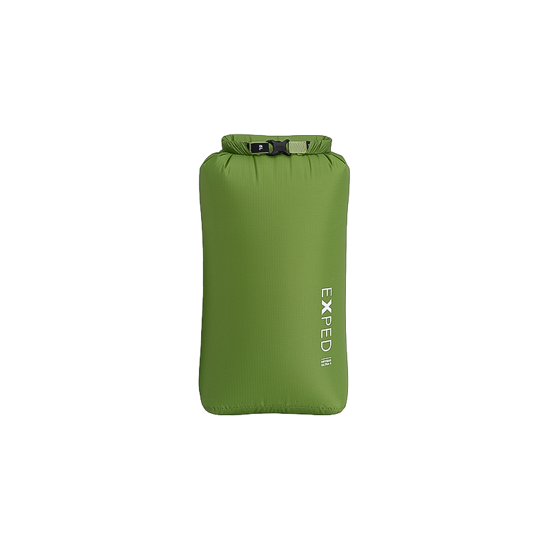 Green dry bag with a black handle, designed for waterproof gear storage in backpacking and kayaking activities.
