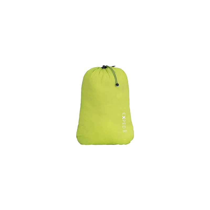 Green Exped Stuffbag Ultra featuring a drawcord closure, made from recycled nylon for waterproof storage of backpacking essentials.