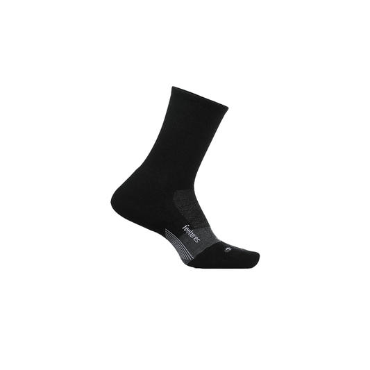 A pair of black Feetures Merino 10 Ultra Light Mini Crew socks on a white background, designed for comfort and performance.