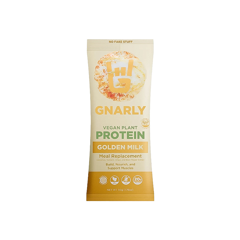 Golden milk Gnarly Vegan protein powder in a sachet, featuring a blend of pea, chia, and cranberry seed proteins for plant-based nutrition.