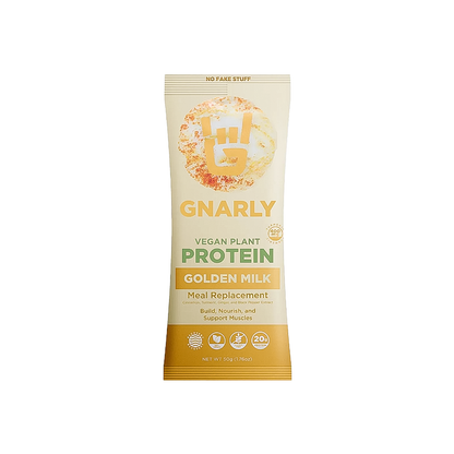 Golden milk Gnarly Vegan protein powder in a sachet, featuring a blend of pea, chia, and cranberry seed proteins for plant-based nutrition.