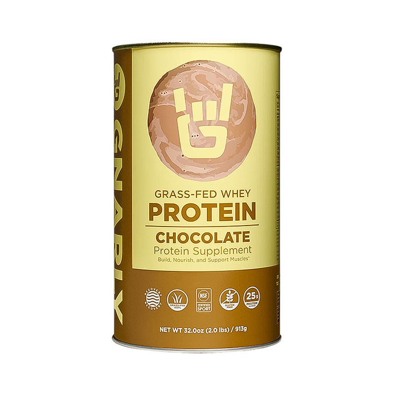 Grass-fed whey chocolate protein powder in a can, promoting muscle recovery and digestive health with 25g protein per serving.