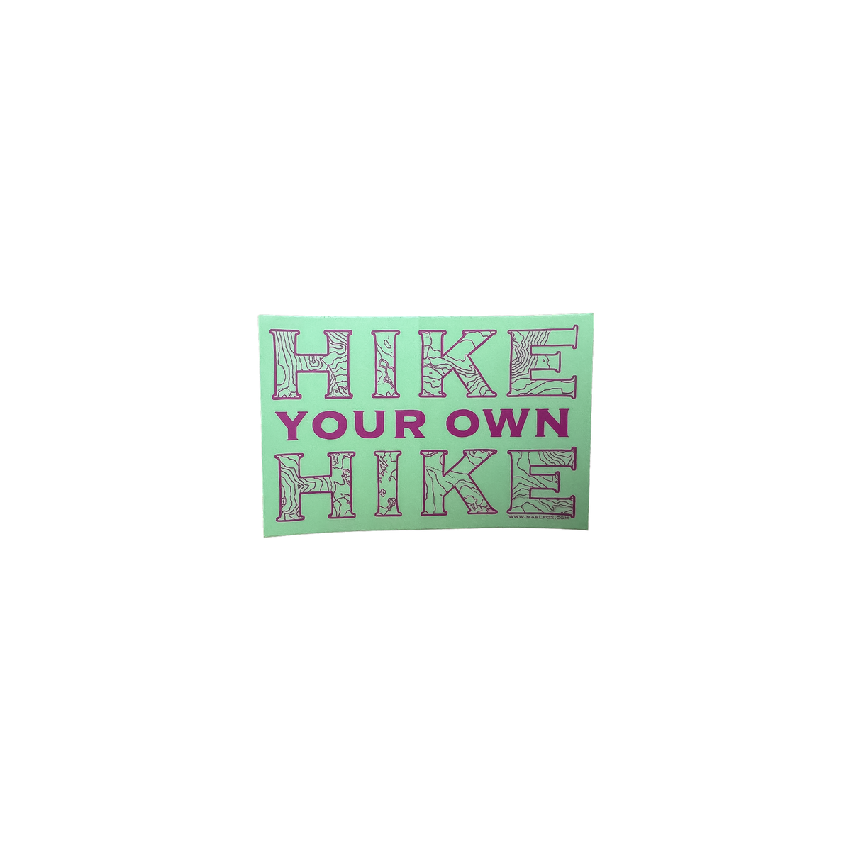 Green "Hike Your Own Hike" sticker with topographic lettering, symbolizing trail independence for hikers and backpackers.