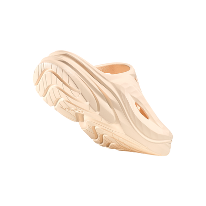 Beige Hoka Ora Recovery Mule sole on a white background designed for comfort and post-workout relaxation.