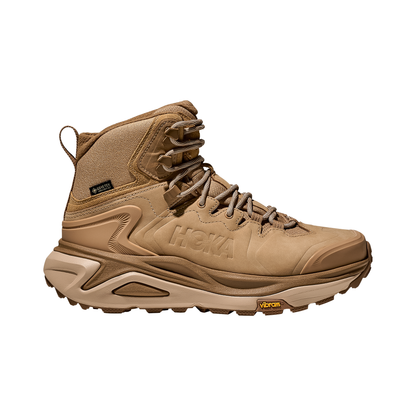 Women's Hoka Kaha 3 GTX hiking boot in light brown leather, designed for comfort and durability in all weather conditions.