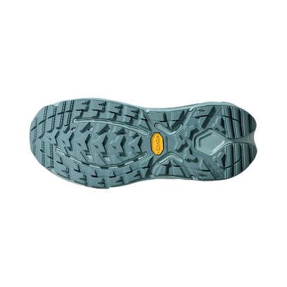 The blue sole of the Hoka Kaha 3 GTX hiking boot, featuring traction lugs for enhanced grip and stability on trails.