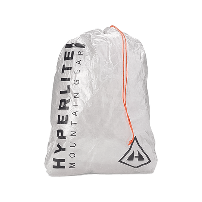White 9L stuff sack labeled "Hyperlite Mountain Gear" for reducing pack weight.