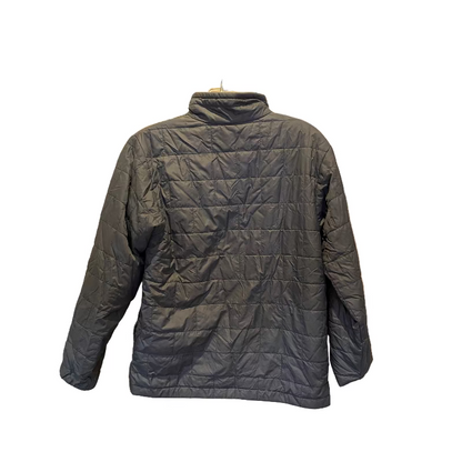 Dark gray quilted jacket on a hanger against a beige wall.