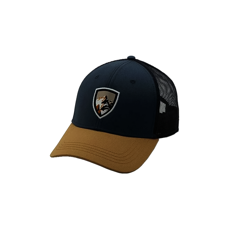 Navy and gold trucker hat with a black and tan patch and embroidered "Born in the Mountains" badge.
