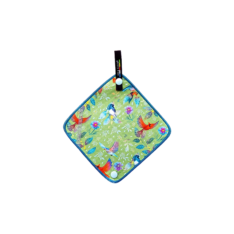 Green pee cloth with birds and flowers, perfect for outdoor use.