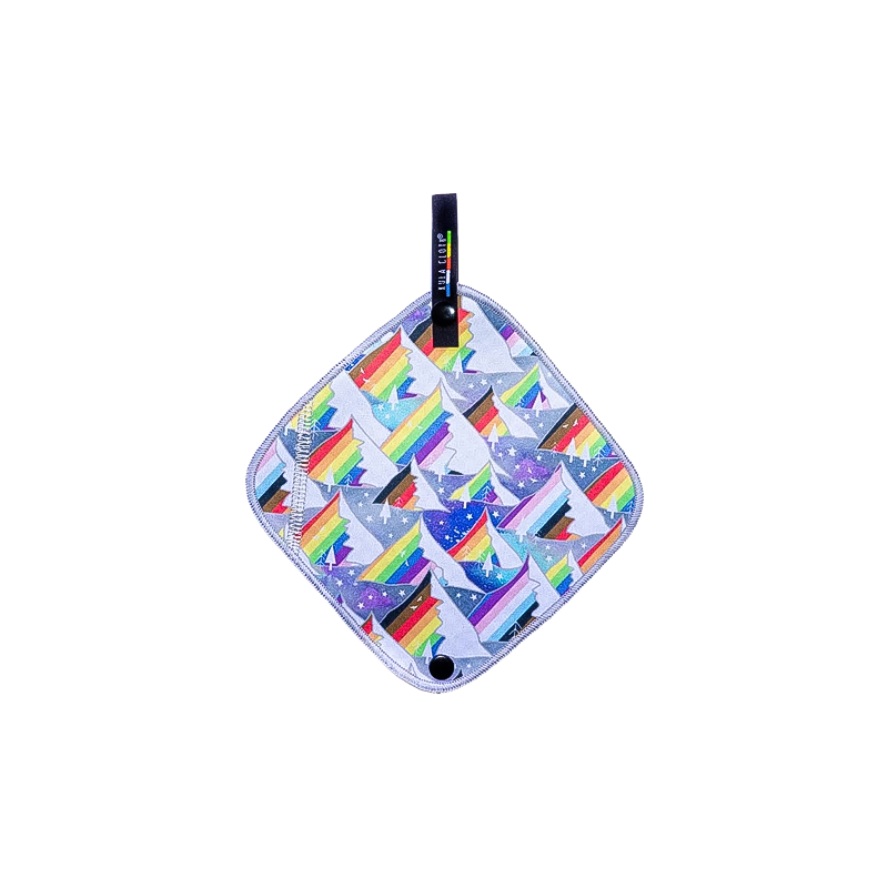 Small rainbow-patterned cloth for outdoor use as a pee cloth.