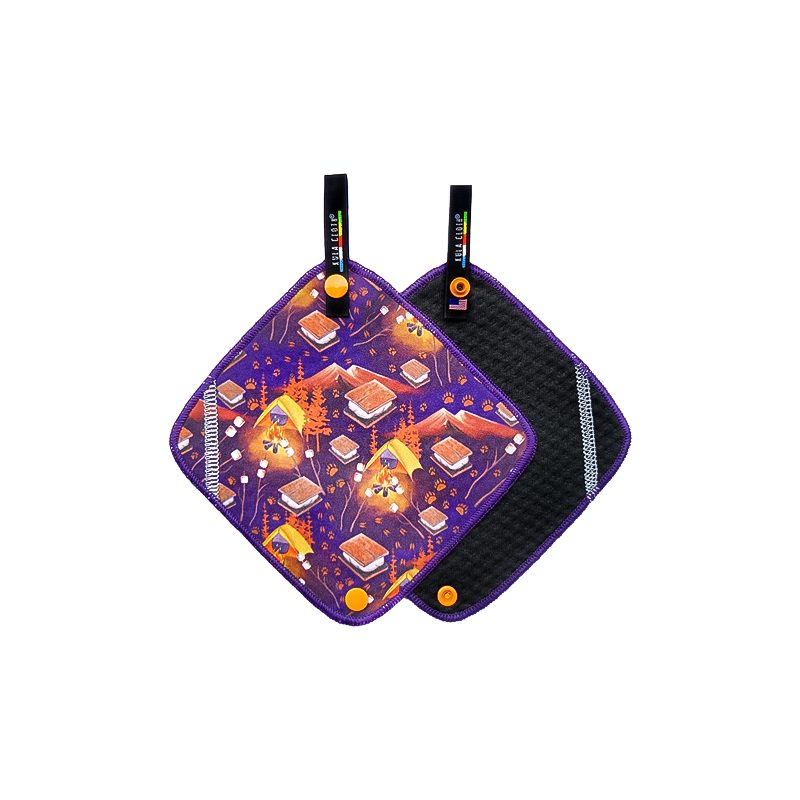 Purple and orange cloth with a black handle, ideal for outdoor use as a pee cloth.
