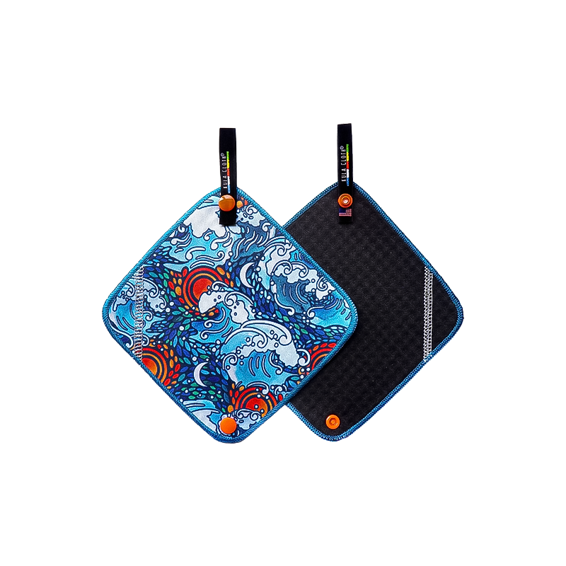 Blue pee towel with colorful waves design, ideal for backpacking and eco-friendly activities.