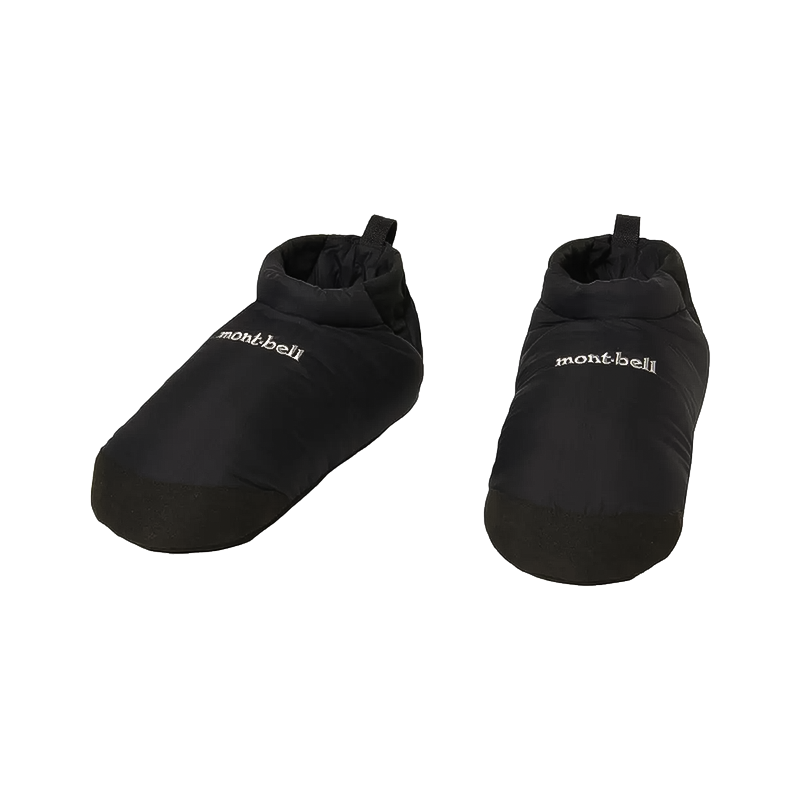 A pair of black Montbell booties designed for cozy indoor wear and relaxation.